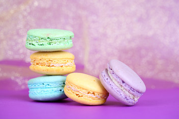 Macaroons on fabric background