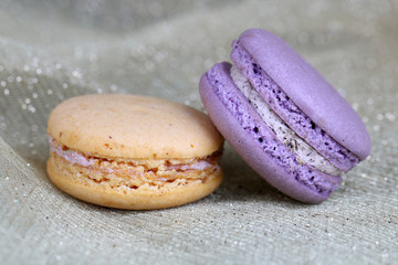 Macaroons on fabric background