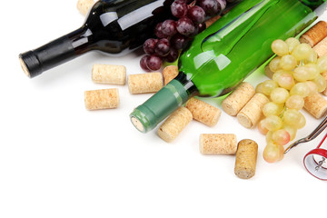 Bottles of wine, grapes and corks, isolated on white