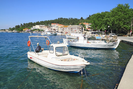 Fishing boats in the old port of Limenas , in Thassos island , G