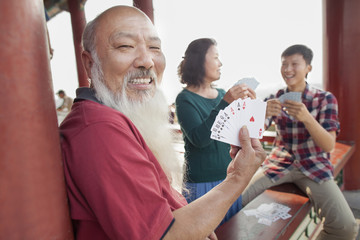 Chinese Family Playing Card In Jing Shan Park