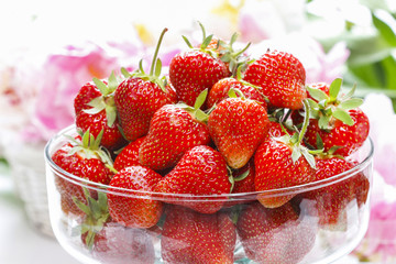 Glass bowl of strawberries