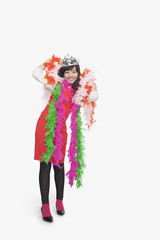 Girl wearing feather boas and tiara