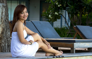 Asian woman portrait relax sitting at the garden
