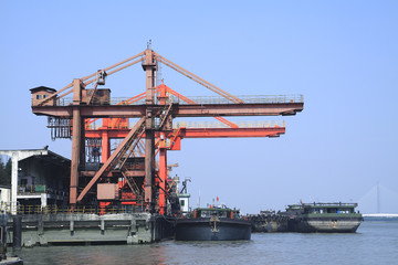 Fototapeta na wymiar The Working the port crane