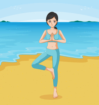 A girl doing yoga at the beach