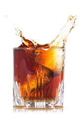 Splash of brown beverage