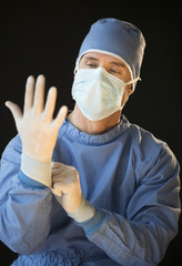 Male Surgeon Preparing For Surgery
