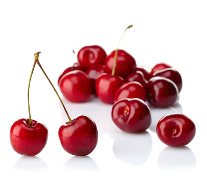 Fresh red cherries on white background