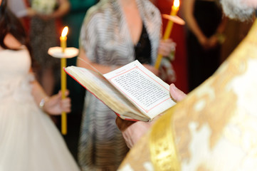 Priest with Bible