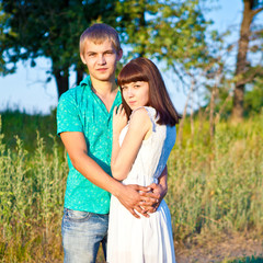 Young beautiful couple outdoor fashion portrait