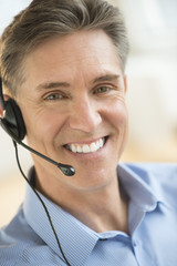 Happy Customer Service Representative Wearing Headset