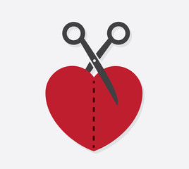 Heart cut in half with scissors