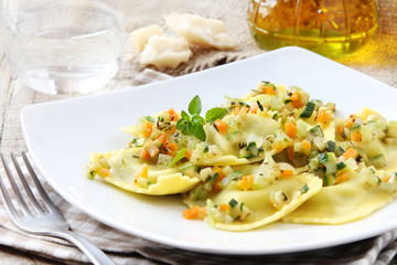 Italian ravioli or tortellini with vegetable sause