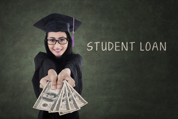 Female graduate paying student loan