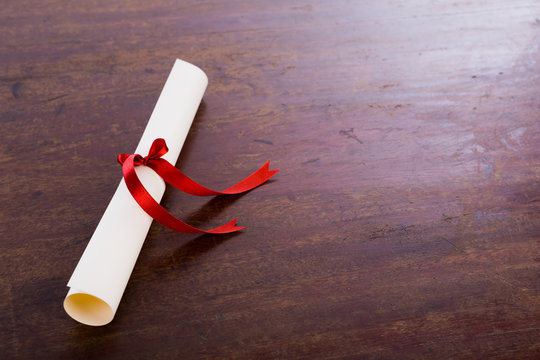 Diploma on wood table