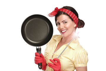 Young beautiful woman housewife showing a magic wand on dishes - 54089466