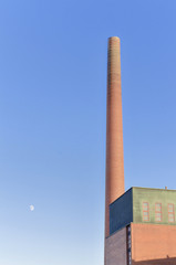 Fototapeta premium Old industrial brick chimney in Tampere Finland.
