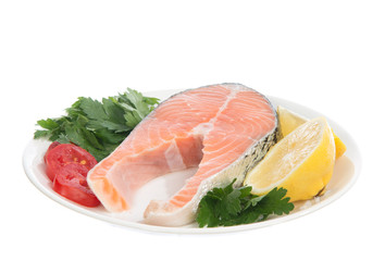 Raw salmon steak red fish on a plate