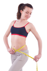 Young girl with centimeter in dieting concept