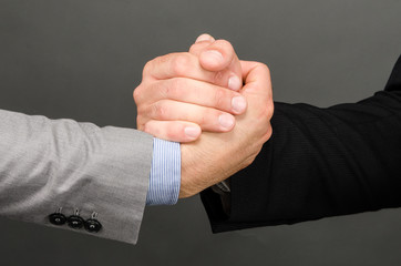 Obraz premium Suit handshake