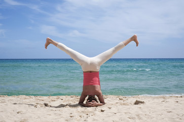 Yoga on the beach in Sardinia