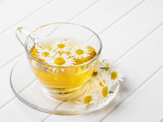 chamomile tea on a white table