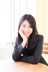 asian businesswoman relaxing in the cafe