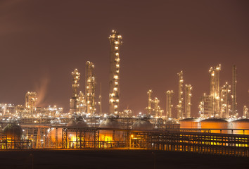 Fototapeta premium Refinery industrial plant with Industry boiler at night