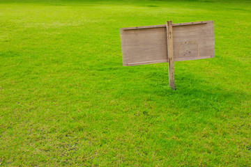 sign in green grass
