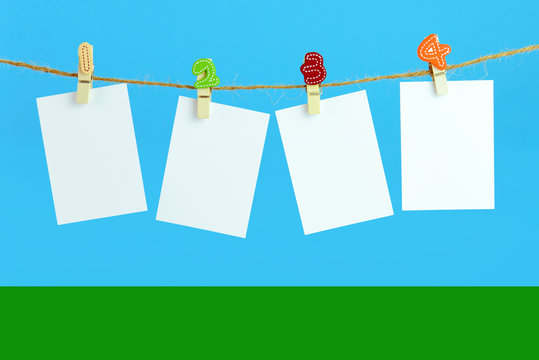 Hanging plain cards on clothesline
