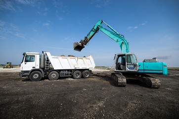 dredger loading truck