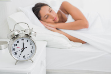Woman sleeping deeply in bed