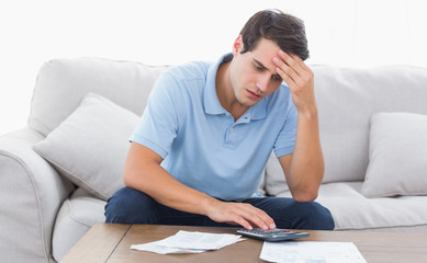 Fototapeta premium Man doing his accounts