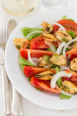 salad with seafood on the plate