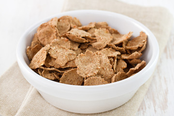 cereals in white bowl