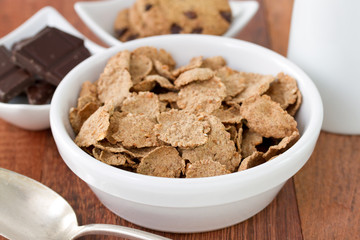 cereals in white bowl with spoon