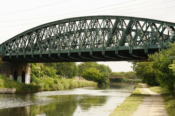 Fototapeta na wymiar Iron Bridge over the Canal