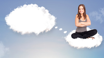 Young girl sitting on cloud and thinking of abstract speech bubb