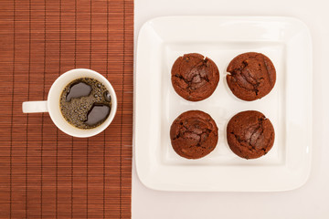 Chocolate Muffins with a cup of coffee