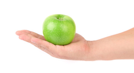 Granny Smith of apple from low perspective. Hand.