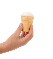 Hand and ice-cream in waffle cup