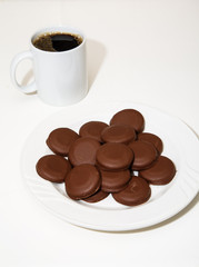 Thin Mint Cookies and Cup of Coffee on White