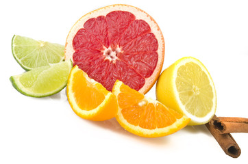 Fototapeta na wymiar Orange lemon grapefruit and lime sliced on the white