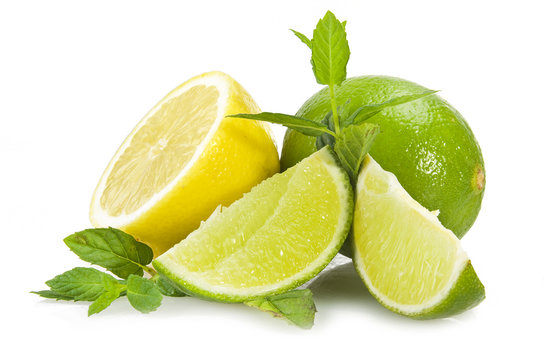 Lime,lemon and fresh leaves of mint on white
