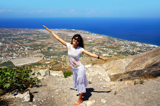 Happy woman on Santorini island
