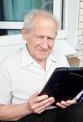 Senior Man With Tablet