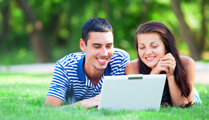 Students with laptop at outdoor