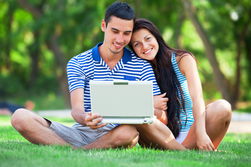 Students with laptop at outdoor