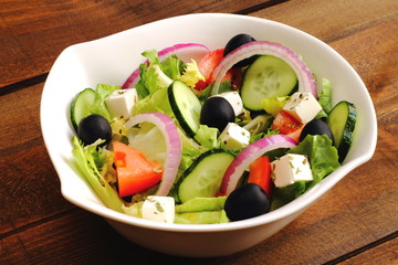 Greek salad with tomato, cucumber, onion, cheese and olives